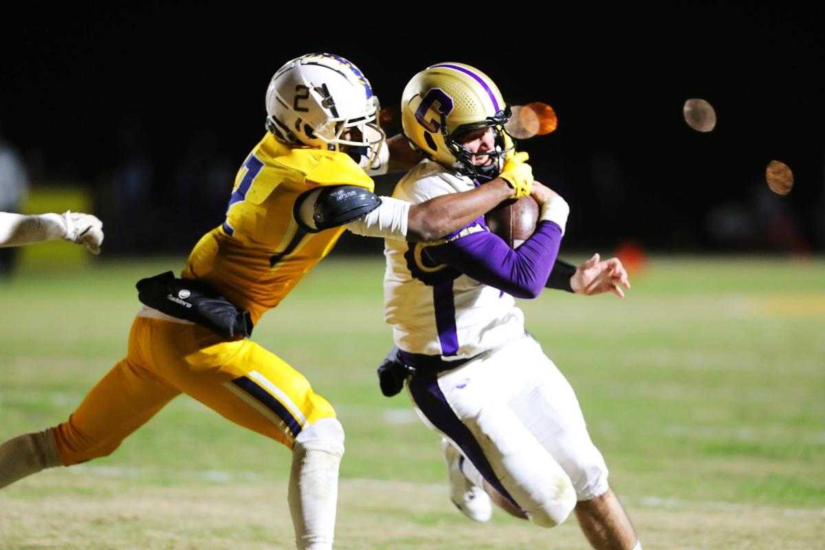 Brock Coffman (2) and the Sayre defense have taken a step forward in leading the Spartans to a 14-0 record this season.