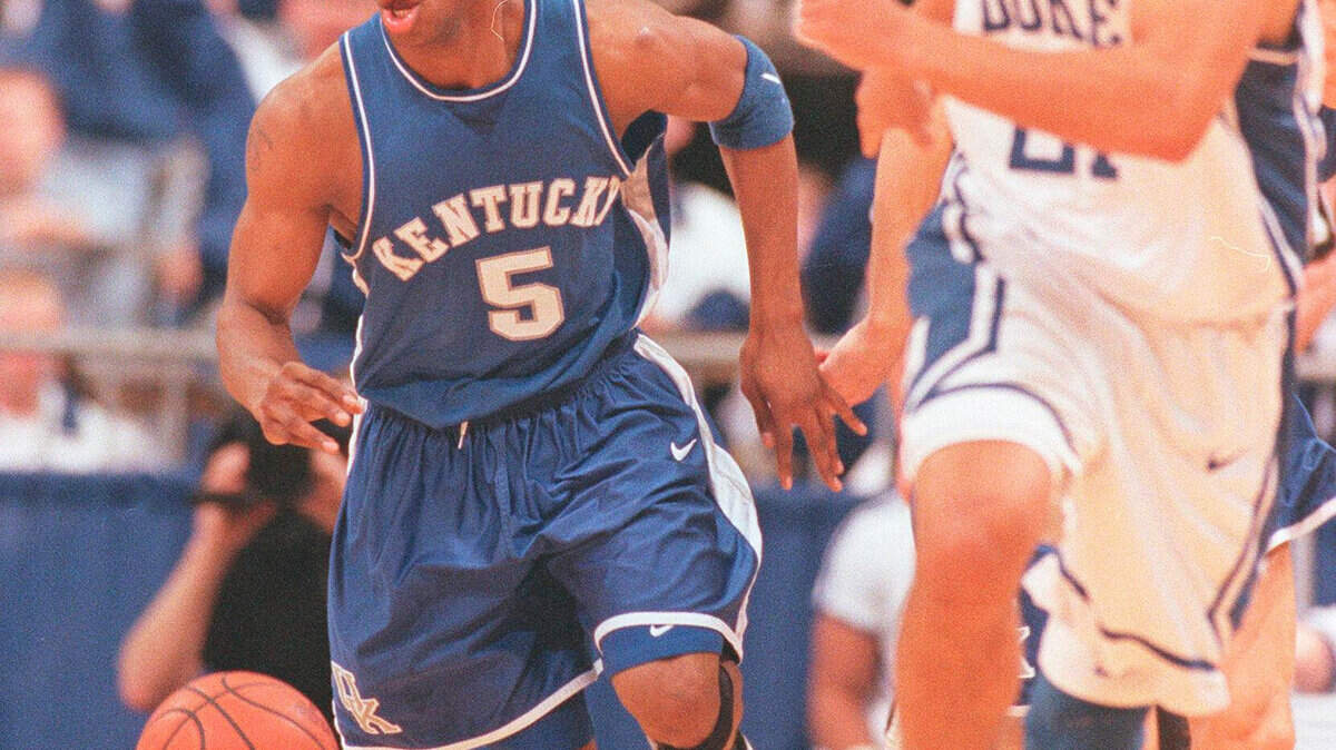 Wayne Turner moves the ball upcourt against Duke in the NCAA South Regional  Final in St. Petersburg, Ky on Sunday March 23, 1998. UK defeated Duke. Photo by Charles Bertram | Staff