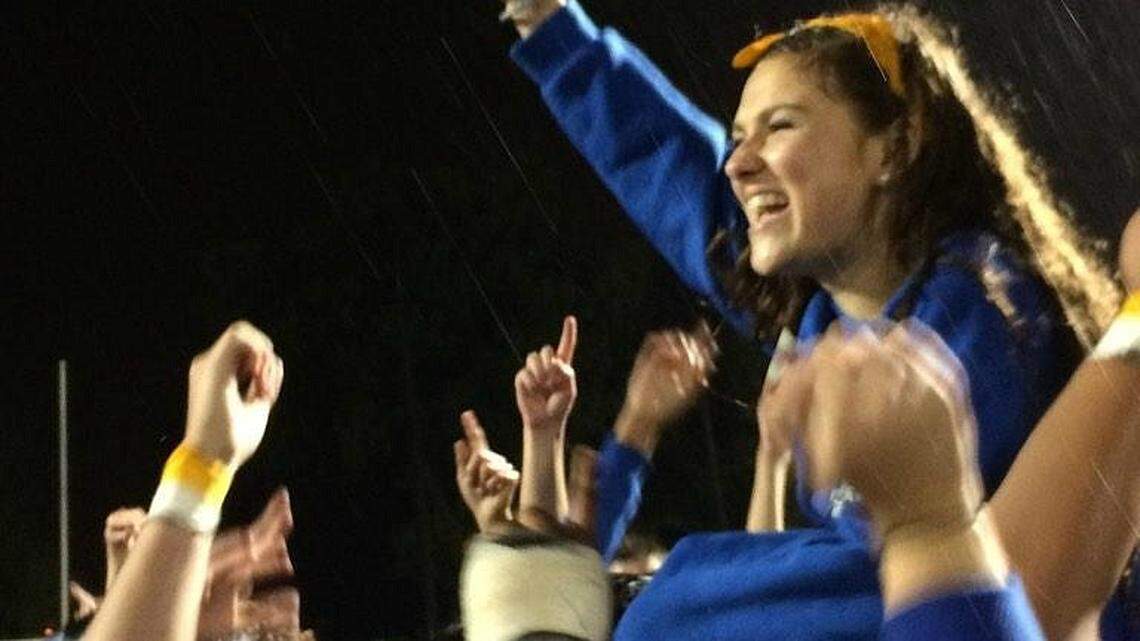 Lexington Catholic football players hoisted Gracie Kirn on their shoulders after their victory over Boyle County on Oct. 3. Gracie's mom, Lee Anne Kirn, was a guidance counselor at the school. Lee Anne Kirn died Oct. 1 at age 49. Photo provided.
