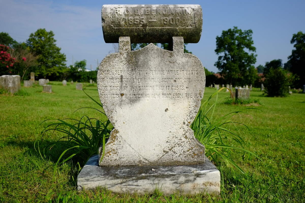 R.C.O. Benjamin’s headstone at African Cemetery No. 2 on East Seventh Street. The faded epitaph is an 1834 poem by William Wordsworth.