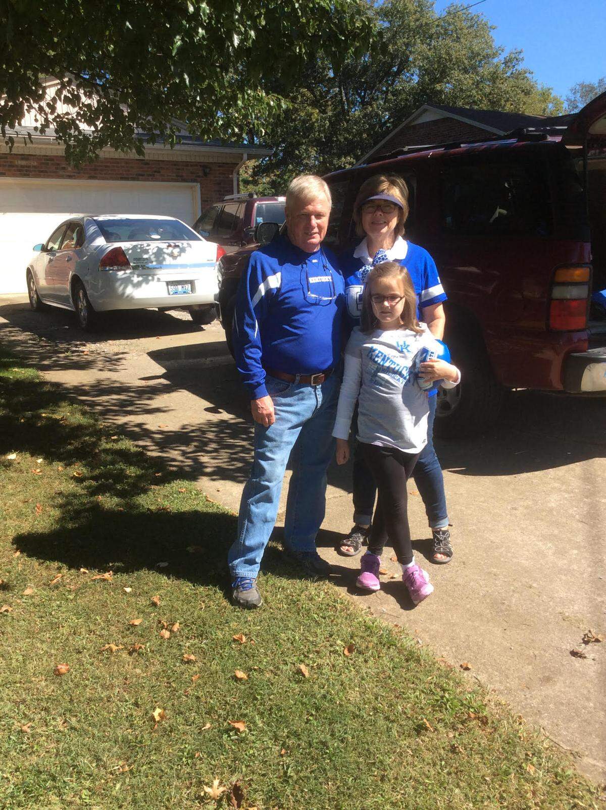 Leslie Hurst and Donna Hurst, photographed with one of their granddaughters, Avenley Cole.