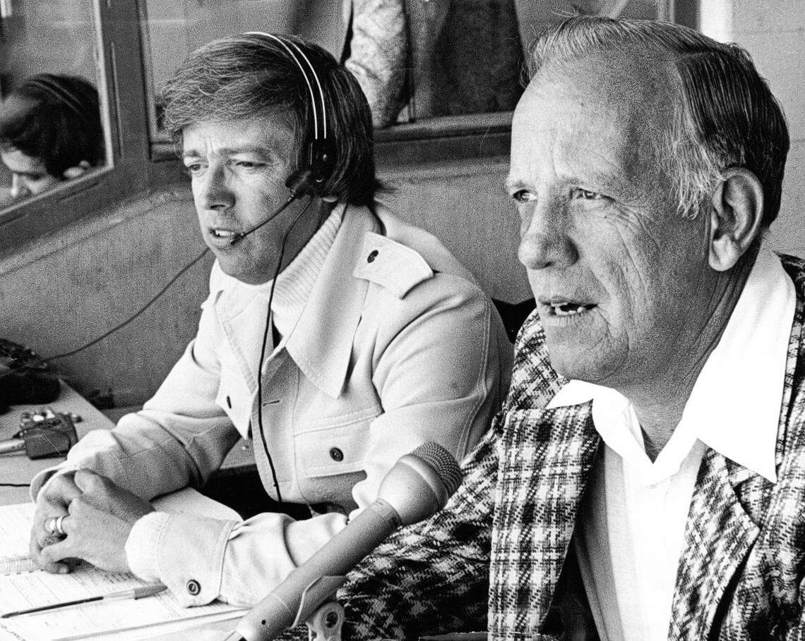 Cincinnati Reds broadcasters Marty Brennaman, left, and Joe Nuxhall in the radio booth at Riverfront Stadium in Cincinnati in 1976. Brennaman, 77, called his final Reds game Thursday before retirement.