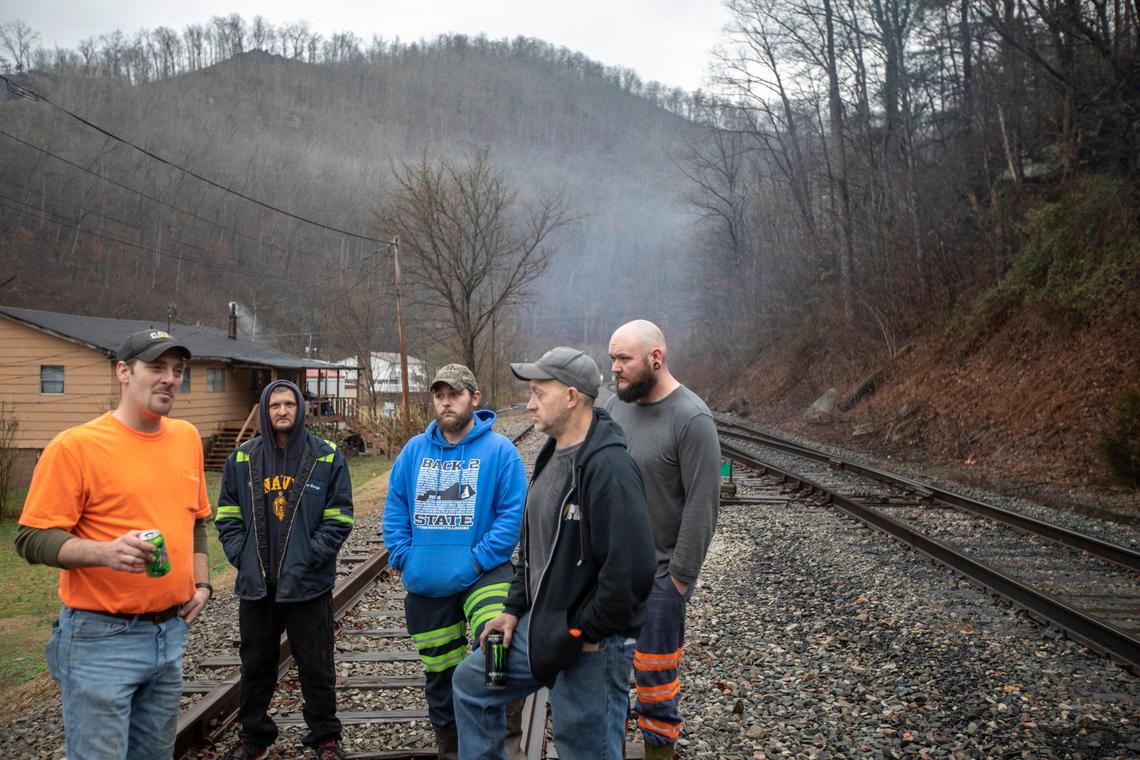 Miners, who say they haven’t been paid in three weeks, block a coal train in Pike County, Ky., Tuesday, Jan. 14, 2020.