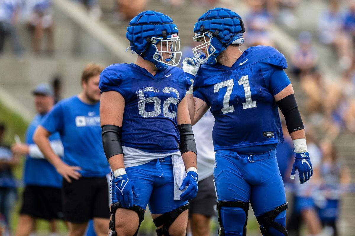 Former Frederick Douglass star Jager Burton (62) and former Christian Academy-Louisville standout John Young (71) are two of Kentucky’s options on its offensive line.
