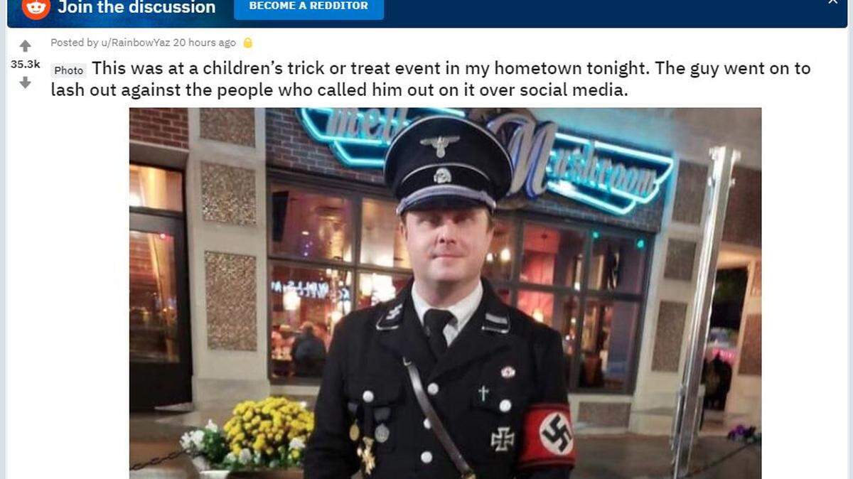 A photo of Bryant Goldbach and his son, who was dressed as Hitler, was widely discussed on Reddit Friday.