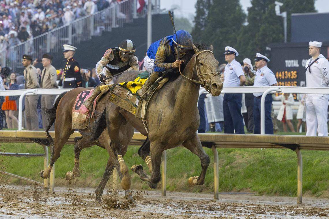 Sovereignty (18), with jockey Junior Alvarado up, outruns Sandman to win the 151st running of the Kentucky Derby at Churchill Downs in Louisville.
