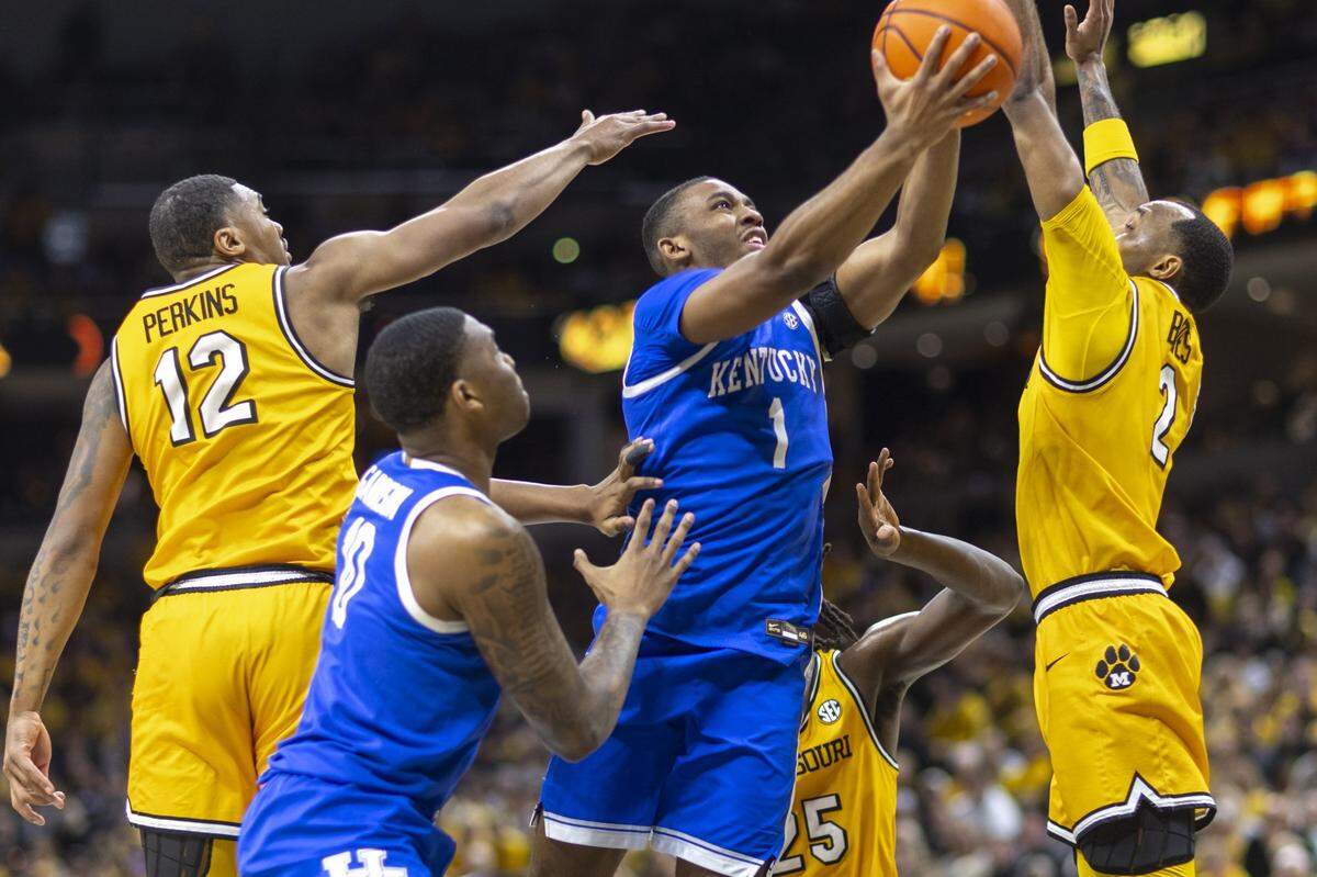 Kentucky guard Lamont Butler (1) drives against Missouri’s Tamar Bates (2) during Saturday’s game at Mizzou Arena in Columbia, Mo.