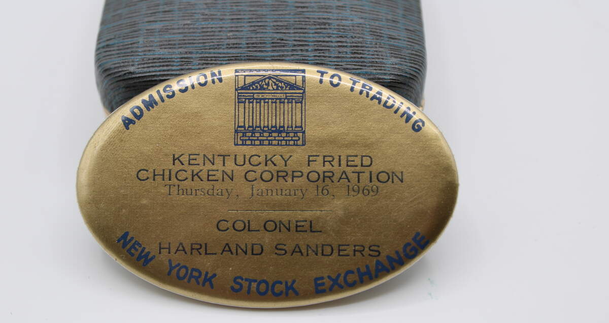 This floor badge was issued by the New York Stock Exchange to Colonel Sanders in 1969 when Kentucky Fried Chicken became listed for public trading on Wall Street.