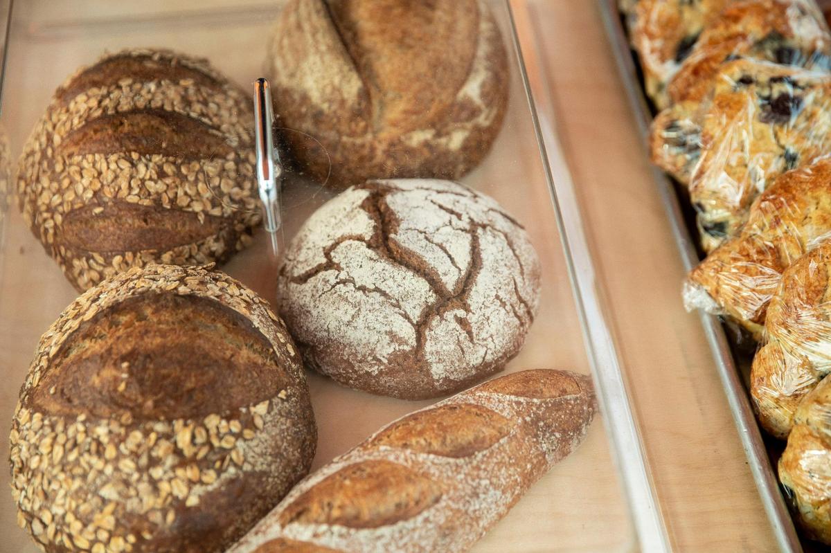 Andy Brown sells his baked goods – including rye bread, made with Kentucky-grown rye – at the Chevy Chase Farmers Market at Apostles Anglican Church in Lexington, Ky., on Wednesday, April 20, 2022.
