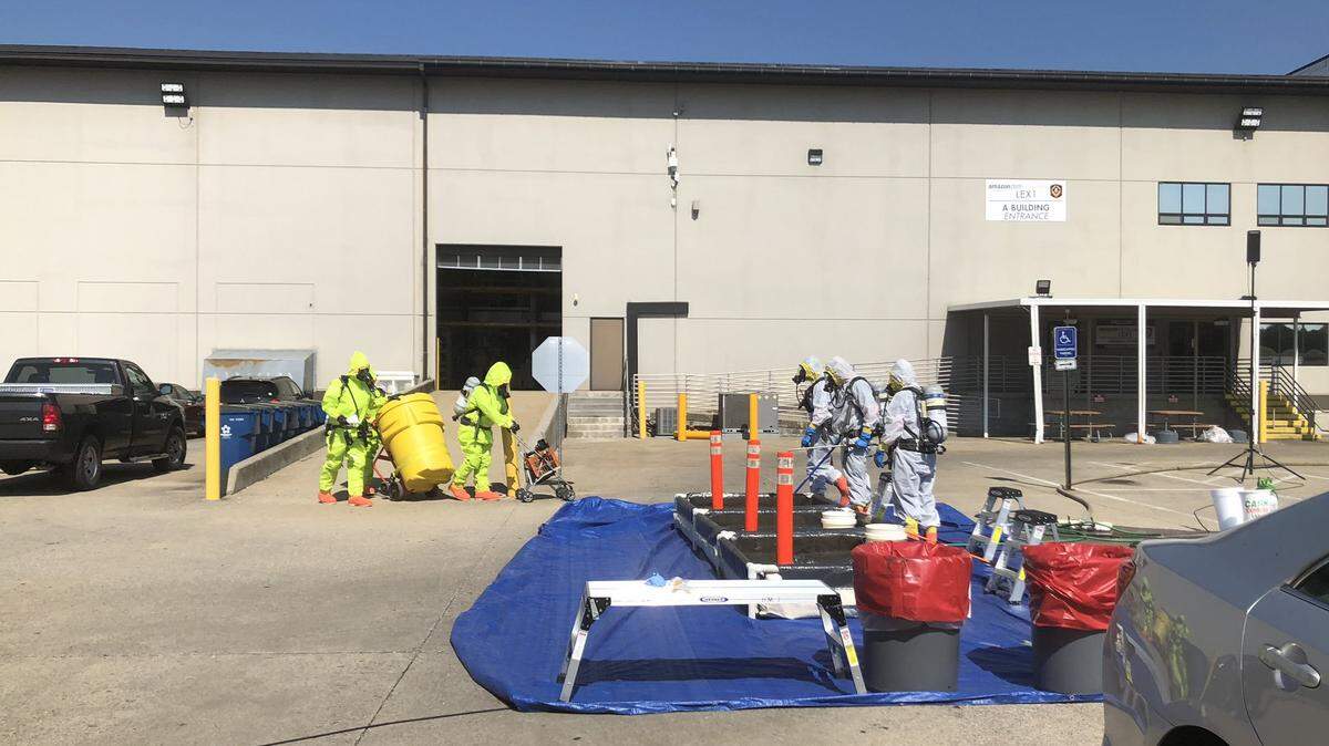 Lexington Fire Department crews removed a package from the Amazon Fulfillment Center Friday morning.