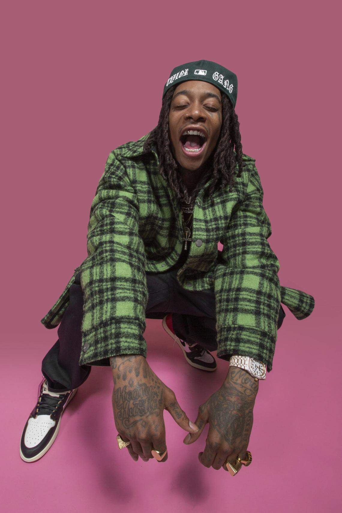 Wiz Khalifa, known for songs celebrating cannabis, is all business when it comes to his career.