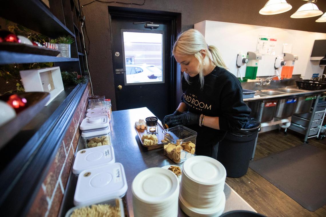 The Board Room Charcuterie and Wine offers a chocolate fondue board with marshmallows, graham crackers and Rice Krispie treats or a single-serving charcuterie wine glass stuffed to the top with meats, cheeses and fresh fruit in Morehead, Ky., Tuesday, December 6, 2022.