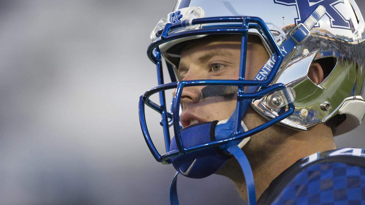 Kentucky quarterback Patrick Towles was a starter last season, but that doesn't mean he'll stay atop the depth chart this fall. Towles completed just 50.8 percent of his passes over UK's last four games in 2014, with two touchdowns and five interceptions.       