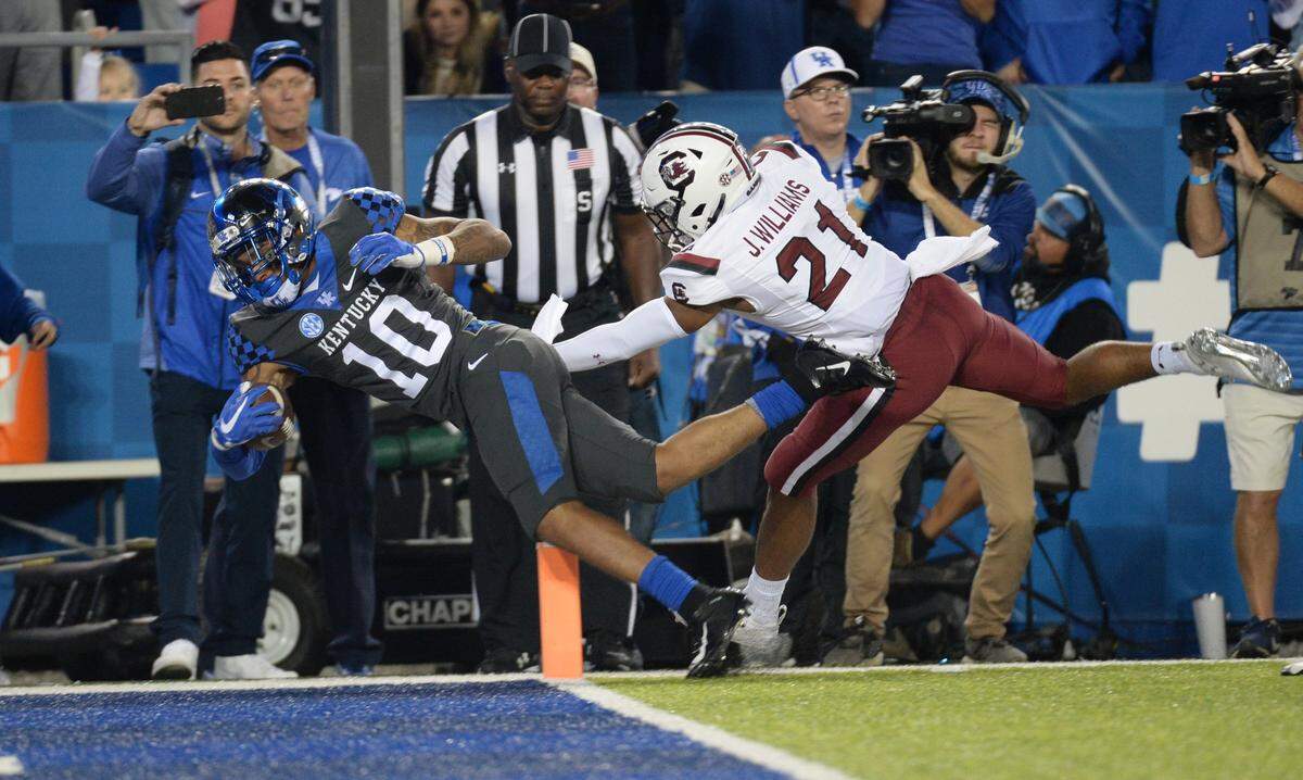 Kentucky running back A.J. Rose scored on a 24-yard run last year in UK's 24-10 victory over South Carolina at Kroger Field.