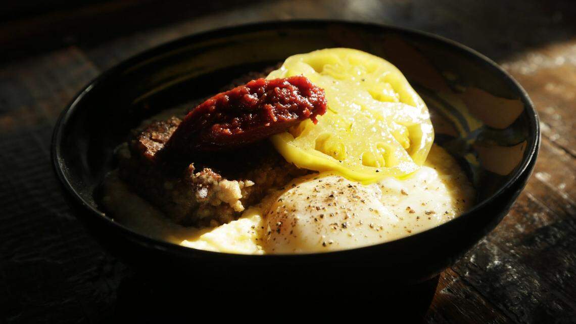 Hog’nOats made with Goetta sausage and grits and a fresh farm egg at Middle Fork Kitchen Bar in the Pepper Distillery campus in Lexington, Ky., on Aug. 24, 2015. Photo by Pablo Alcala | Staff