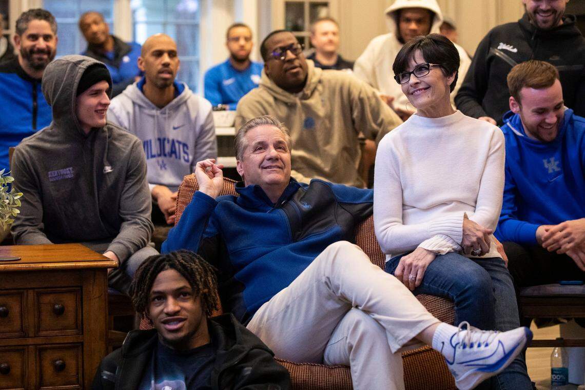 Kentucky head coach John Calipari waits with his wife, Ellen, and the team to find out their seed and opponent for the NCAA Tournament at the Calipari home in Lexington on Sunday night.
