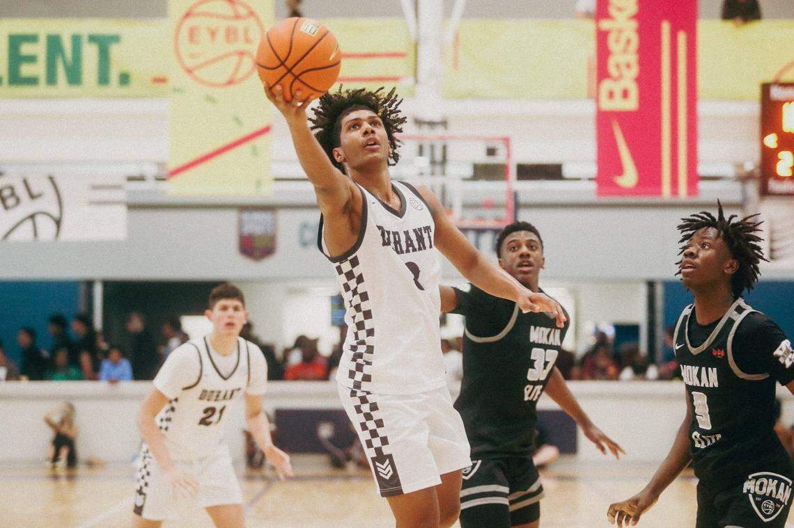 Team Durant's Acaden Lewis (8) goes for a lay up during a game against Team Mokan Elite during the Nike Elite Youth Basketball League session one on Saturday, April 27, 2024 at the Memphis Sports & Event Center in Memphis, Tenn.