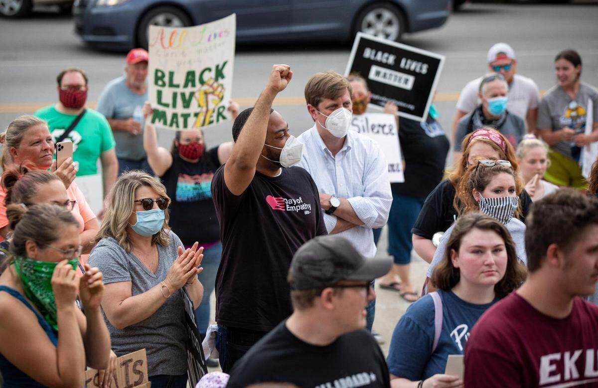 Rep. Charles Booker is introduced to the crowd of protesters gather in front of the Estill County courthouse during a Black Lives Matter protest in Irvine, Ky., Monday, June 8, 2020.