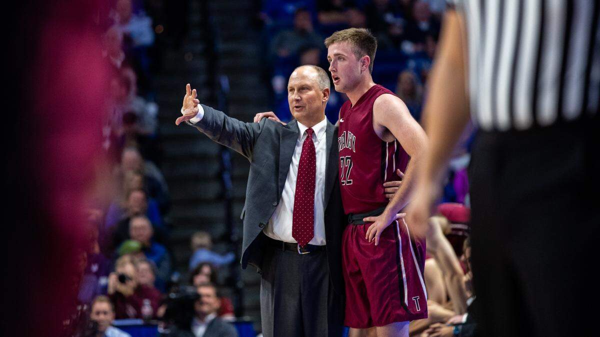 Coach Brian Lane talked to Lucas Gentry as Transylvania played Kentucky in an exhibition game in Rupp Arena last year. Gentry scored 22 points Wednesday to help Lane pick up his 300th career win.