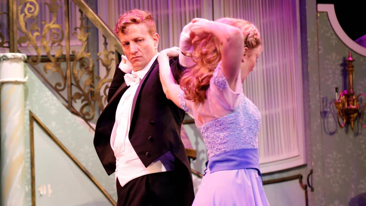 From left, Jeremy Landon Hays as Captain von Trapp dances with Hayley Podschun who is playing Maria Rainer Wednesday, July 11, 2023 at the Lexington Opera House in Lexington, Ky.
