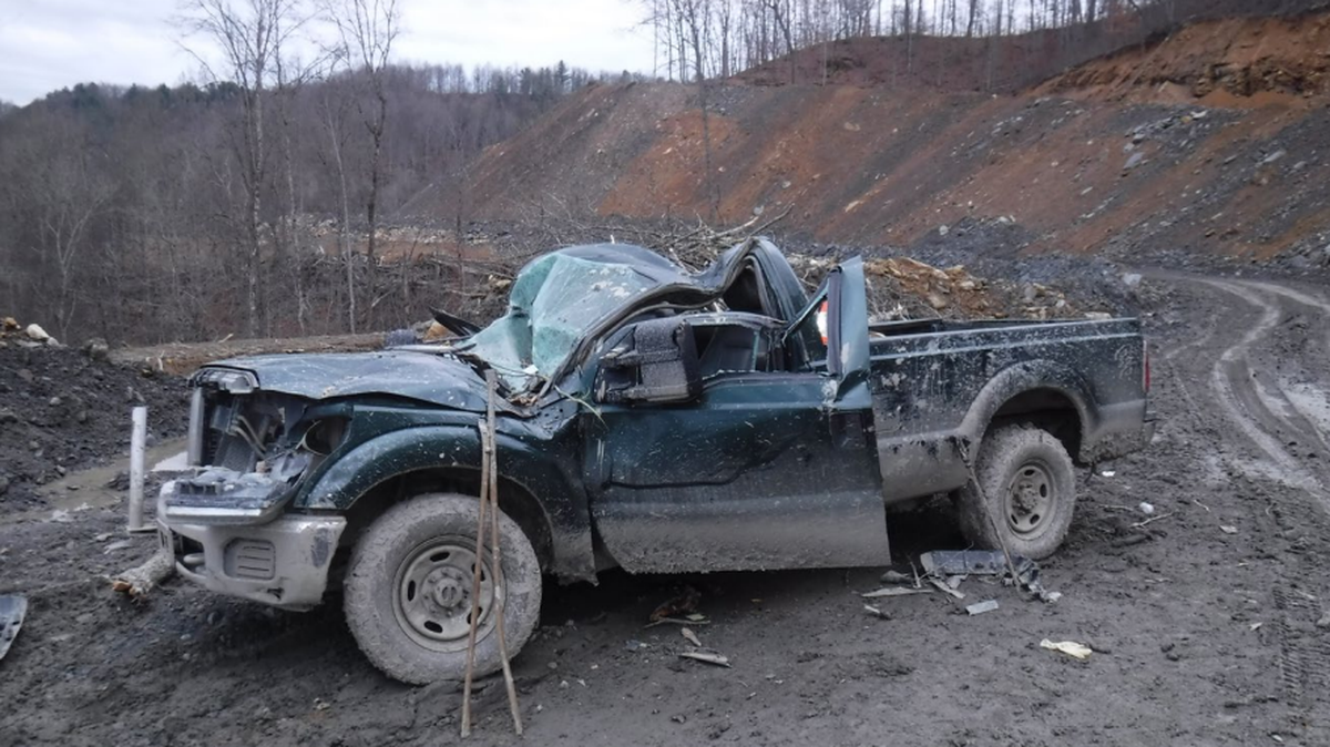 One man was killed and another injured in January 2022 when a tree fell on this pickup truck at a surface mine in Bell County, Ky.