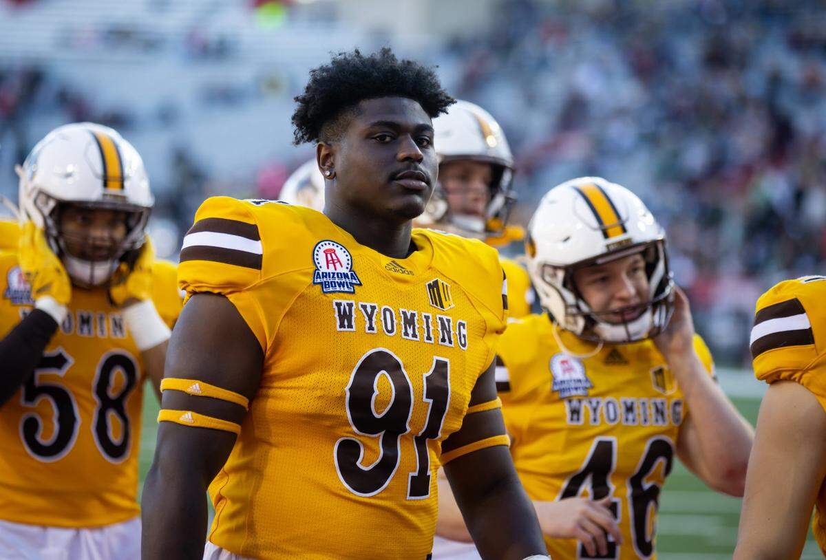 Dec 30, 2022; Tucson, AZ, USA; Wyoming Cowboys defensive tackle Jaden Williams (91) against the Ohio Bobcats during the 2022 Barstool Sports Arizona Bowl at Arizona Stadium. Mandatory Credit: Mark J. Rebilas-USA TODAY Sports