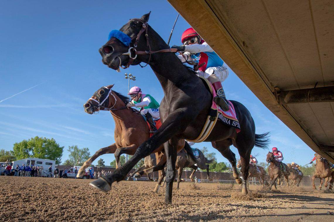 Kentucky Derby winner Medina Spirit, inside with John Velazquez on board, came out of the fourth turn as Mandaloun and jockey Florent Geroux were in hot pursuit Saturday.