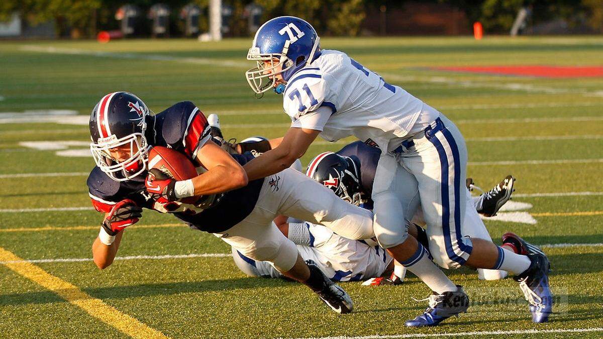 Lafayette's Josh Dunn scored a touchdown past Mason Co.'s John Buchanan in the first quarter of the Mason Co. at Lafayette football game at  Lafayette High School in Lexington, Ky., on Aug. 17, 2012.   Photo by Pablo Alcala | Staff