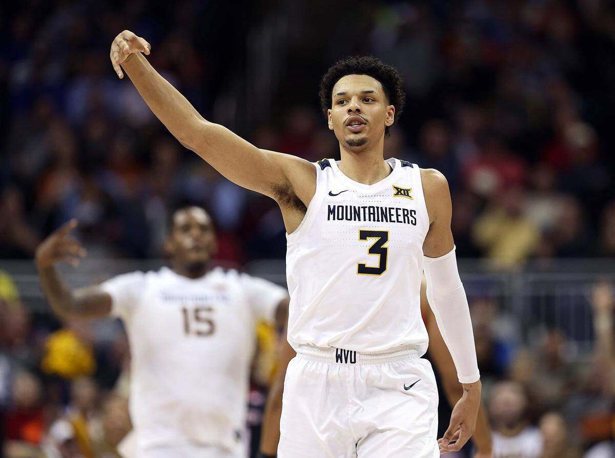 Tre Mitchell decided to transfer to Kentucky after former West Virginia coach Bob Huggins resigned earlier this month.