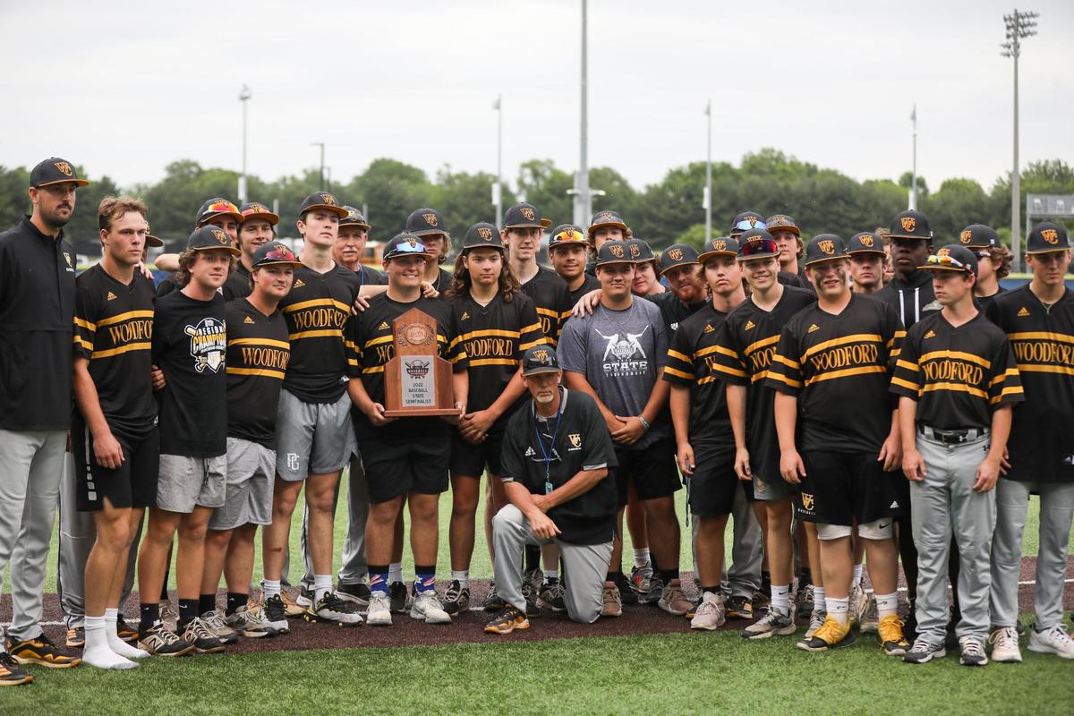 The Woodford County Yellow Jackets accept their semifinalist trophy after their loss to Russell County on Friday at Kentucky Proud Park.