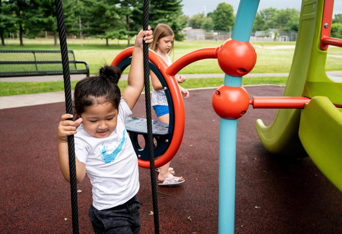 Jameison Irvine, 3, plays on a playground at Valley Park in Lexington, Ky., Tuesday, June 23, 2020. “We just like doing something, because we can’t do anything else,” Jayde Irvine, 14, said about coming to the park.