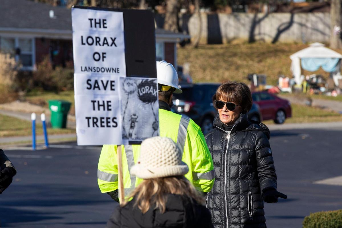 A KU representative spoke with one of the protesters on Lansdowne Drive.