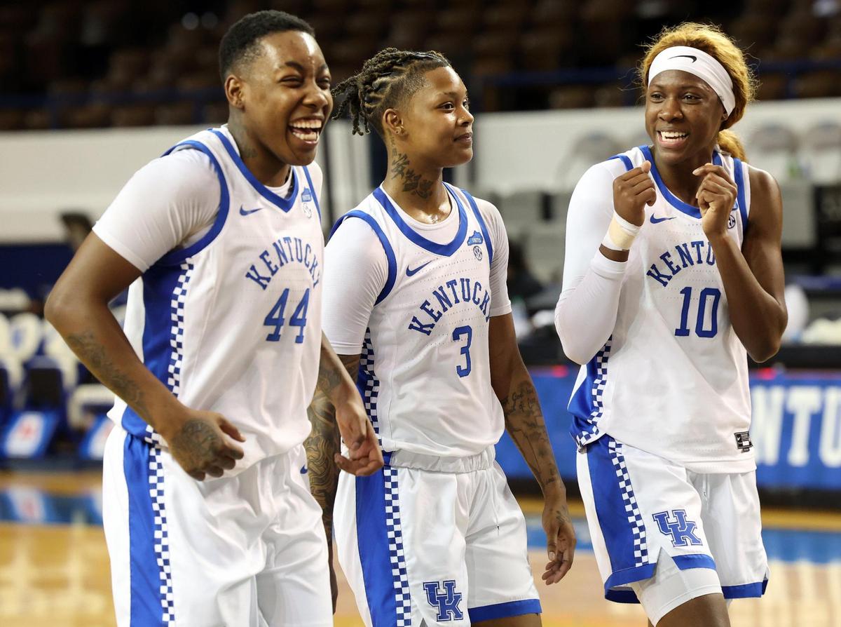 Kentucky’s Dre’una Edwards (44), Jazmine Massengill (3), and Rhyne Howard (10) celebrate after rallying to beat Mississippi State on Feb. 15. The Wildcats and Bulldogs meet again Thursday in the SEC Tournament.