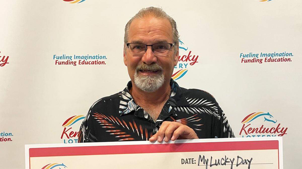Vernon Caldwell of Lawrenceburg, Ky., poses with a big check after he won a $75,000 Kentucky Lottery prize on a scratch-off ticket recently.