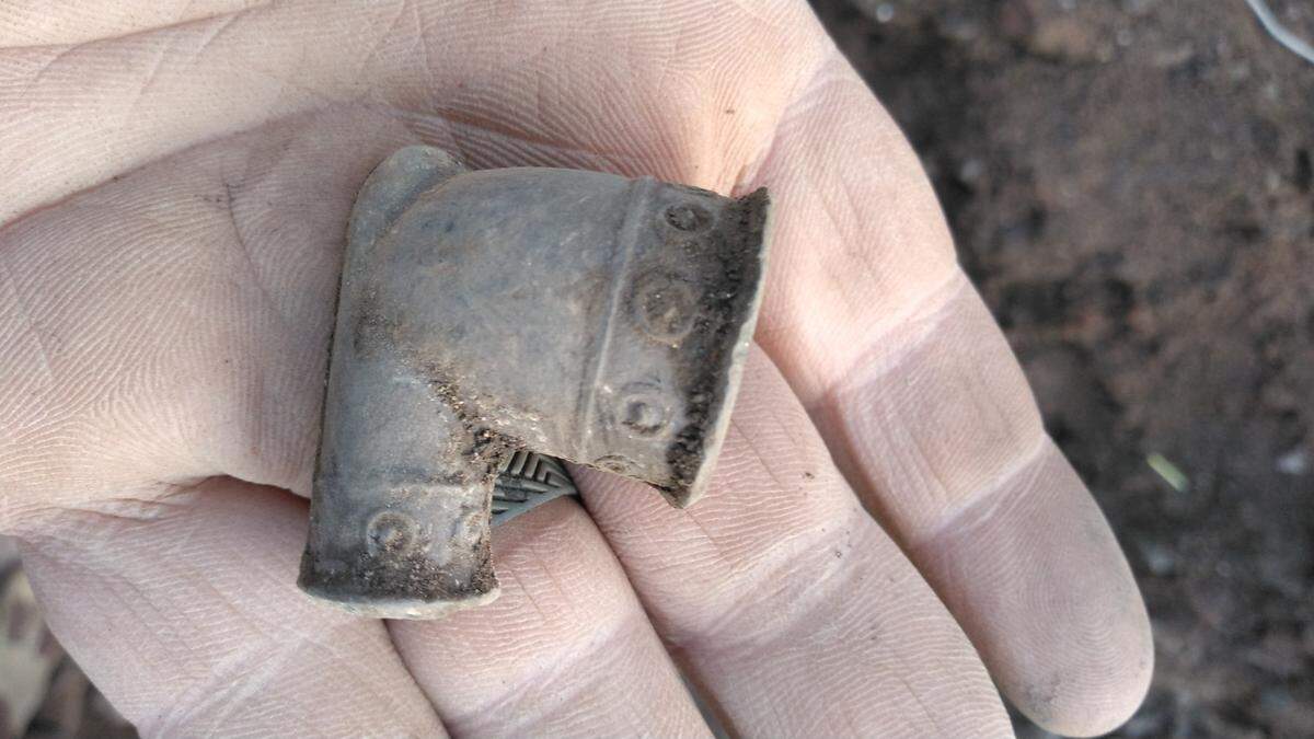 A stone clay pipe found in the remains of a building dating to before 1871 found at the corner of Vine Street and South Limestone during the construction of the Town Branch Commons. The decorations show it is likely Scottish or Welsh.