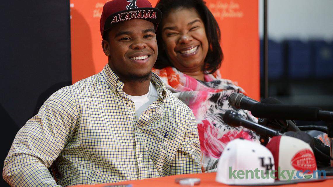 Top recruit Damien Harris,  of Madison Southern , with his mother Lynn by his side, announced he will attend the University of Alabama on Friday January 9, 2015 in Berea, Ky. Photo by Mark Cornelison | Staff