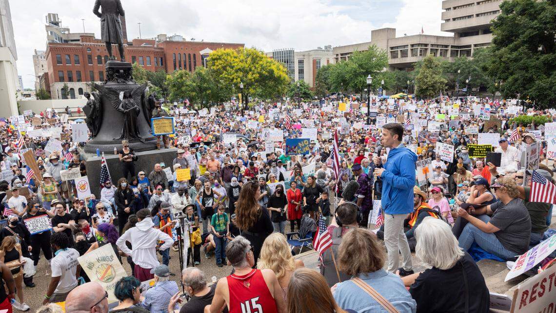 Congressman Morgan McGarvey speaks to the thousands of demonstrators gathered during the ‘No Kings’ march and protest at Metro Hall in downtown Louisville, Kentucky, Saturday, June 14, 2025. ‘No Kings’ rallies organized across the United States in direct response to President Donald Trump’s military parade in Washington D.C.