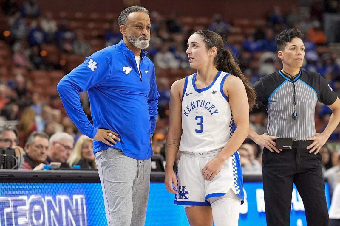 Mar 7, 2025; Greenville, SC, USA; Kentucky Wildcats head coach Kenny Brooks talks with guard Georgia Amoore (3) during a free throw against the Oklahoma Sooners during the second half at Bon Secours Wellness Arena. Mandatory Credit: Jim Dedmon-Imagn Images