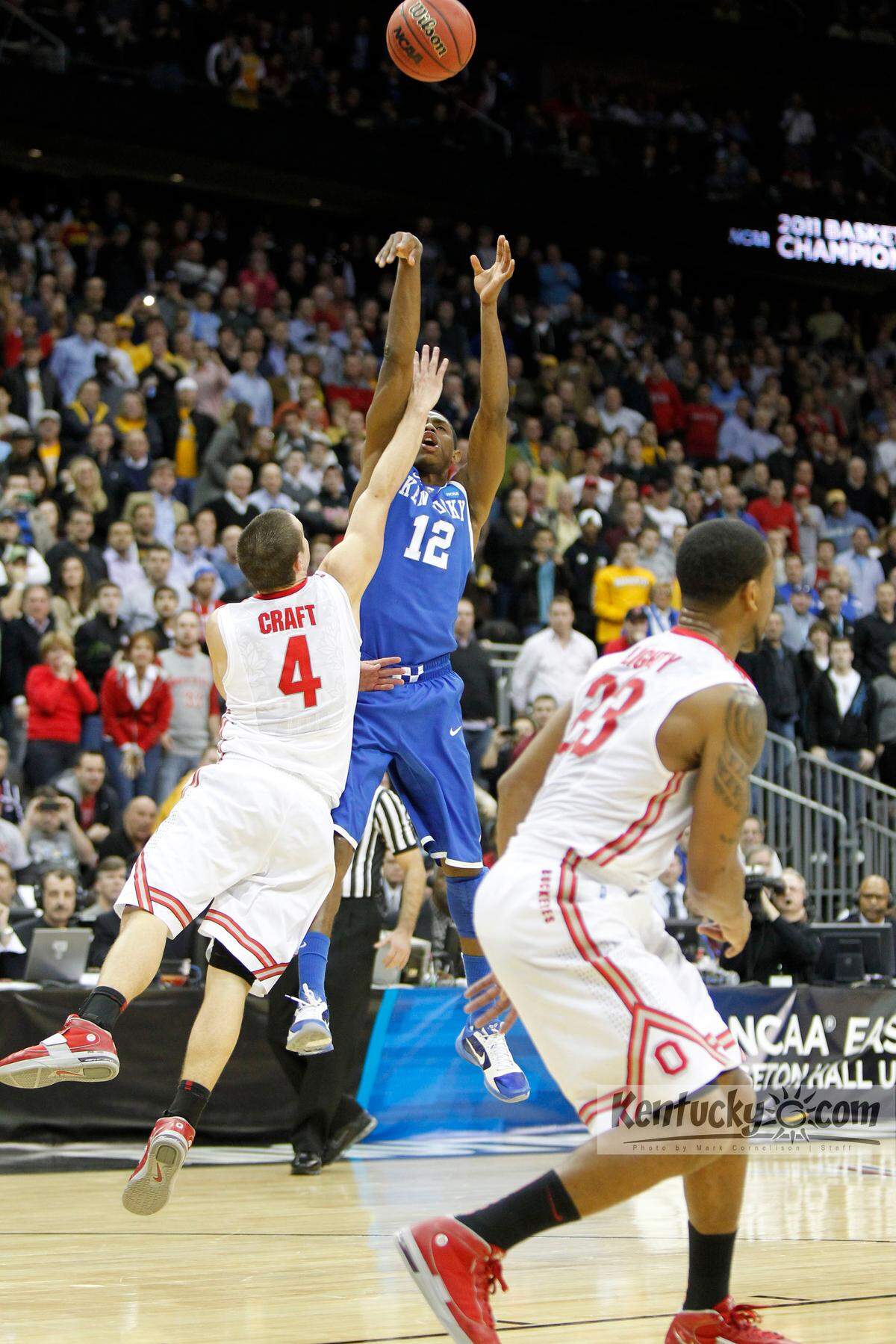 Kentucky guard Brandon Knight (12) shot the game-winning jumper over Ohio State’s Aaron Craft (4) as the Wildcats upset the No. 1 overall seed Buckeyes 62-60 in the 2011 NCAA Tournament round of 16.