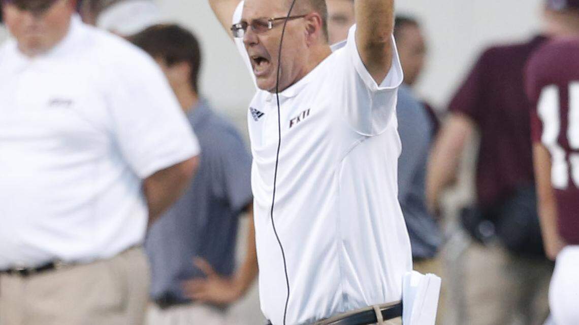 Eastern Kentucky Colonels head coach Dean Hood wanted to hear it from the crowd for his defense as EKU played Robert Morris  on Thursday August 29, 2013 in Richmond, Ky. Photos by Mark Cornelison | Staff