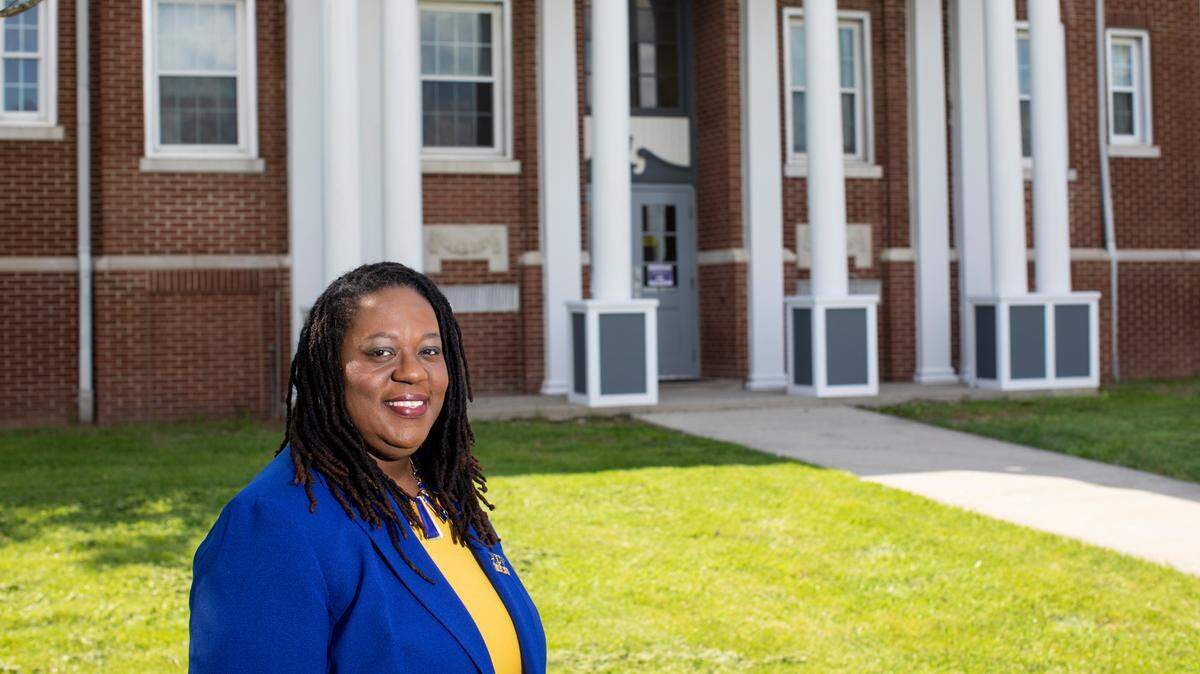 Dr. Shambra Mulder poses for a portrait outside the Rise STEM Academy for Girls in Lexington, Ky., Monday, April 19, 2021.