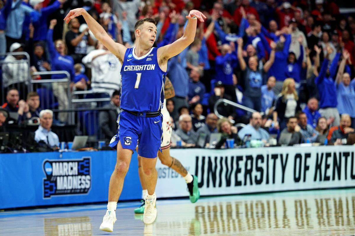 Mar 20, 2025; Lexington, KY, USA; Creighton Bluejays guard Steven Ashworth (1) celebrates after making a three pointer during the second half against the Louisville Cardinals in the first round of the NCAA Tournament at Rupp Arena. Mandatory Credit: Jordan Prather-Imagn Images