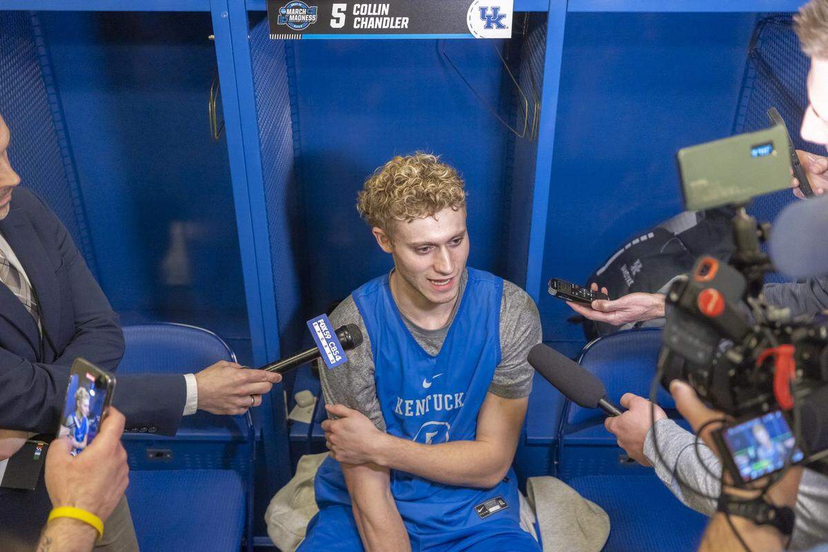 Kentucky’s Collin Chandler talks to reporters at Lucas Oil Stadium in Indianapolis the day before UK’s Sweet 16 game against Tennessee. Chandler delivered the opening statement in UK’s postgame press conference after Kentucky beat Troy in the first round of the NCAA Tournament.