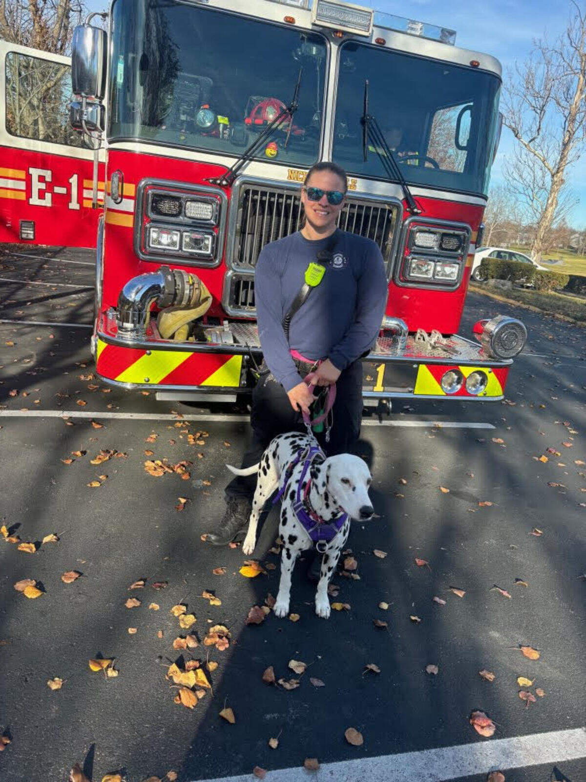Nicholasville firefighters with their Dalmatian mascot, Ashes.