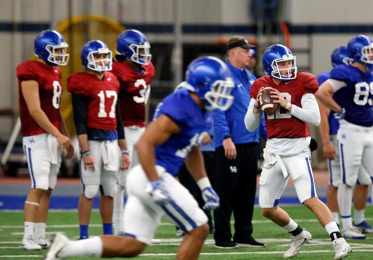 Kentucky is moving closer to a quarterback decision with Gunnar Hoak (12) and Terry Wilson (3) getting nearly equal reps in Saturday’s scrimmage, Mark Stoops said.