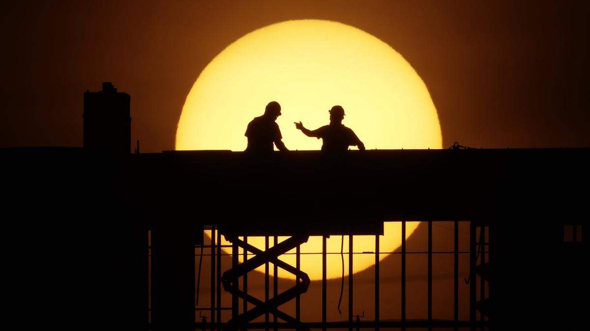 Demand for skilled trades talent is intense, and homebuilders are coping with pandemic-driven disruptions in the supplies of materials. (AP Photo/Charlie Riedel)