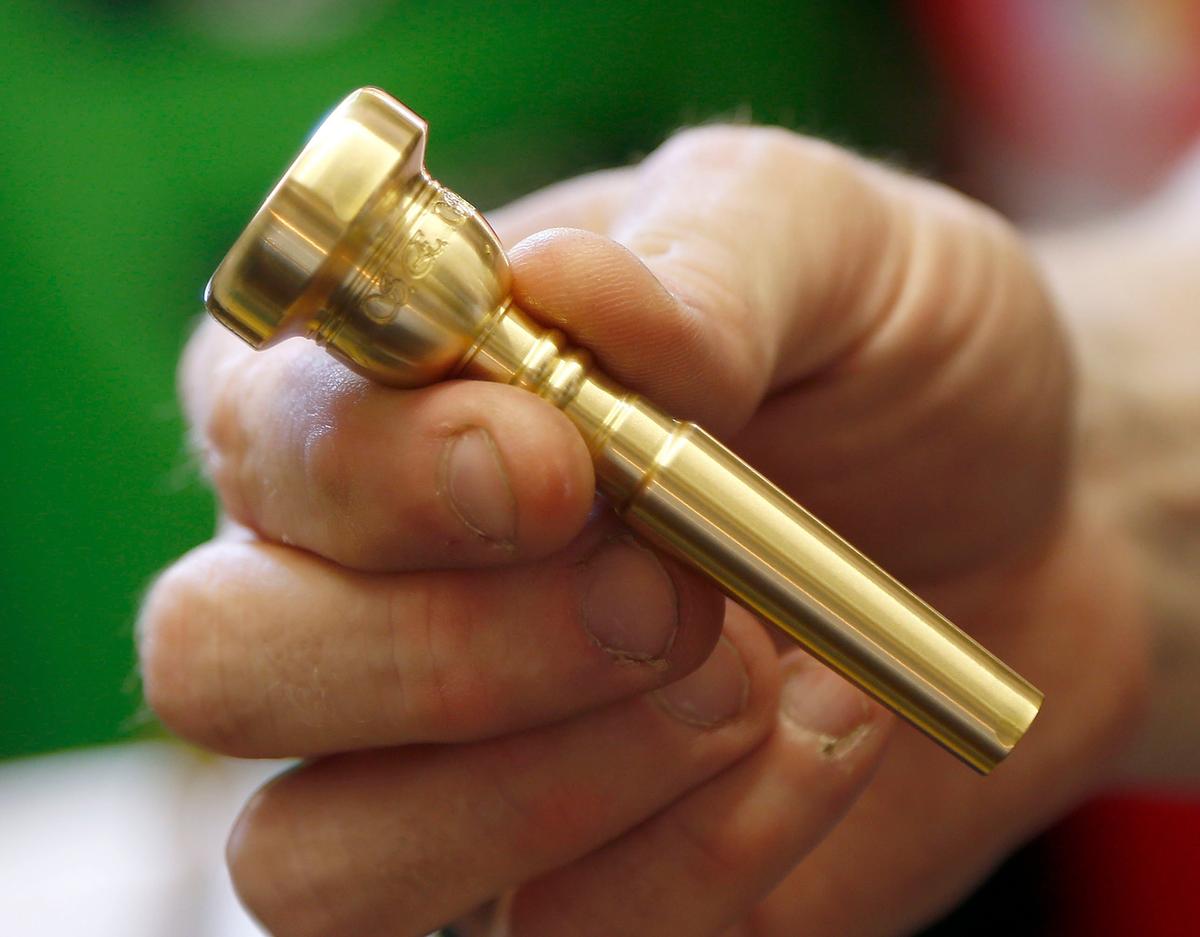 A brass mouthpiece made at Pickett Brass and Blackburn Trumpets, 308 North Ashland Avenue in Lexington.