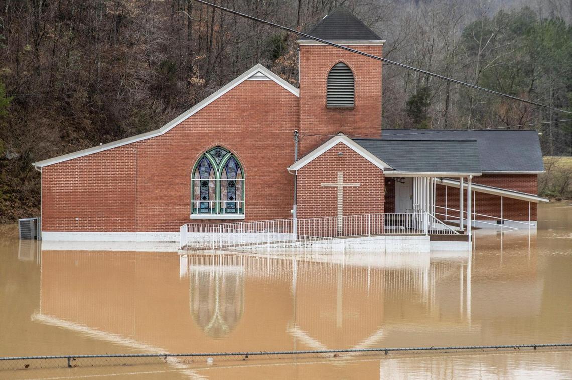 Floodwaters surrounded Rockhouse Freewill Baptist Church in Johnson County on Monday.