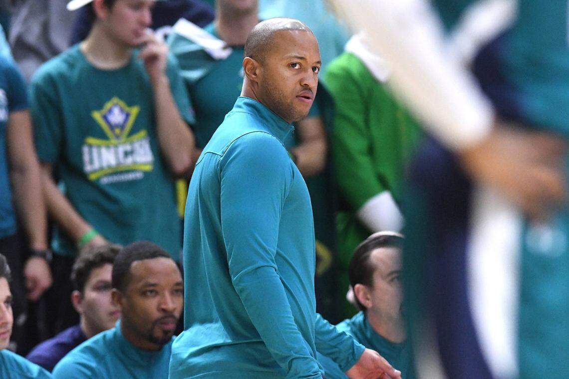 Coach Takayo Siddle looks on at his players on the court as UNCW took on ECU Monday Dec. 6, 2022 at Trask Coliseum in Wilmington, N.C. UNCW beat ECU 74 to 61.Wlm Uncw Hoops Vs Ecu21