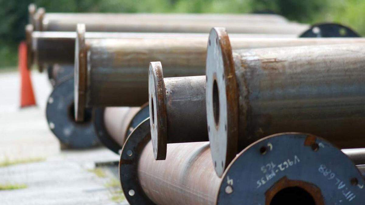 Steel poles to be used for overhead signage.